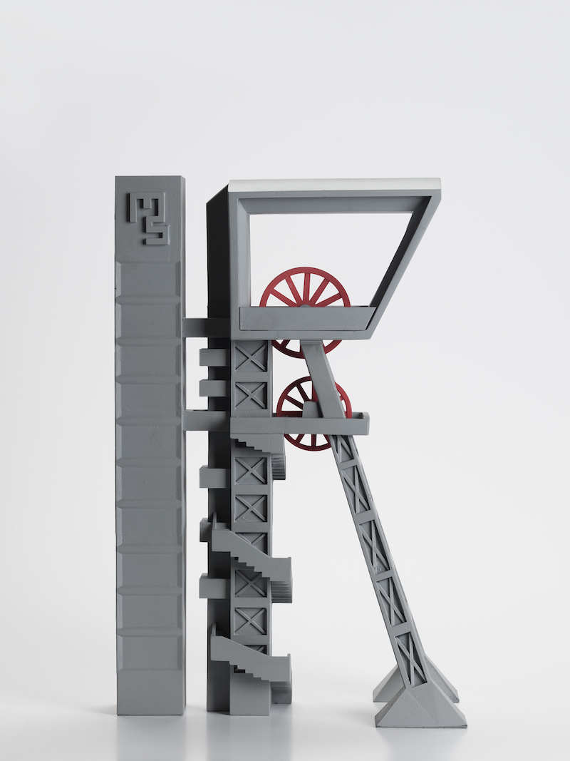 Model wieży widokowej Muzeum Śląskiego. Wykonany techniką druku 3D, odwzorowuje kształt i proporcje prawdziwego obiektu. Posiada ruchome elementy w kształcie kół.